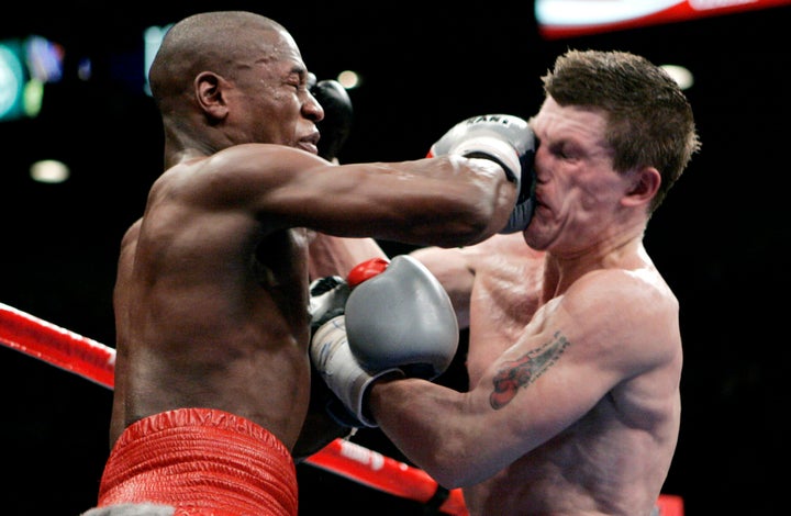 Floyd Mayweather Jr., left, punches Ricky Hatton, right, during their WBC welterweight boxing title fight at the MGM Grand hotel-casino in Las Vegas in 2007.